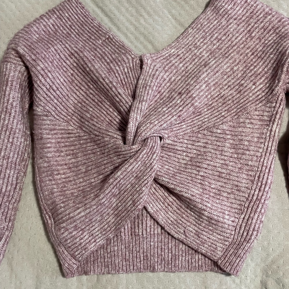 Lovely purple sweater with twisted back design
